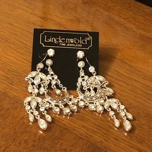BOGO FREE Woman’s set of three silver earrings